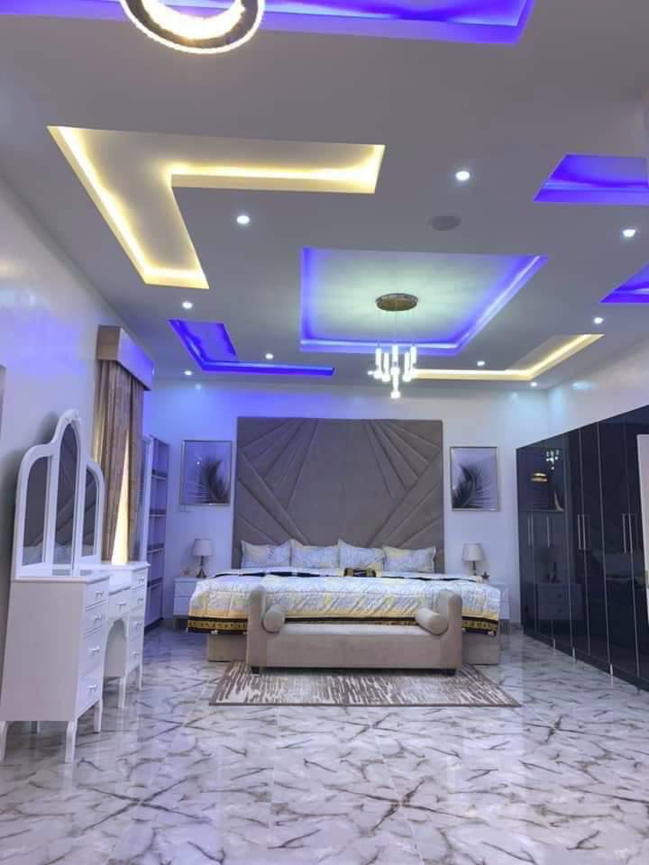 Bedroom suspended ceiling with LED cove lighting