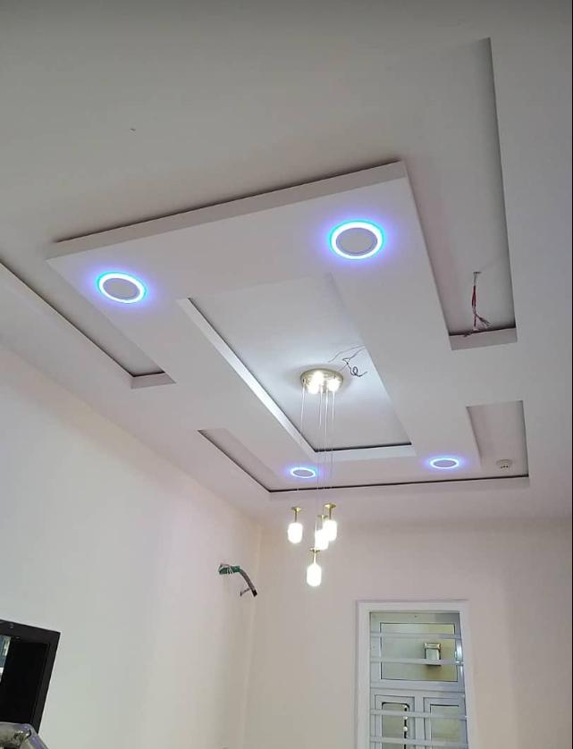 Suspended ceiling with blue LED circle design