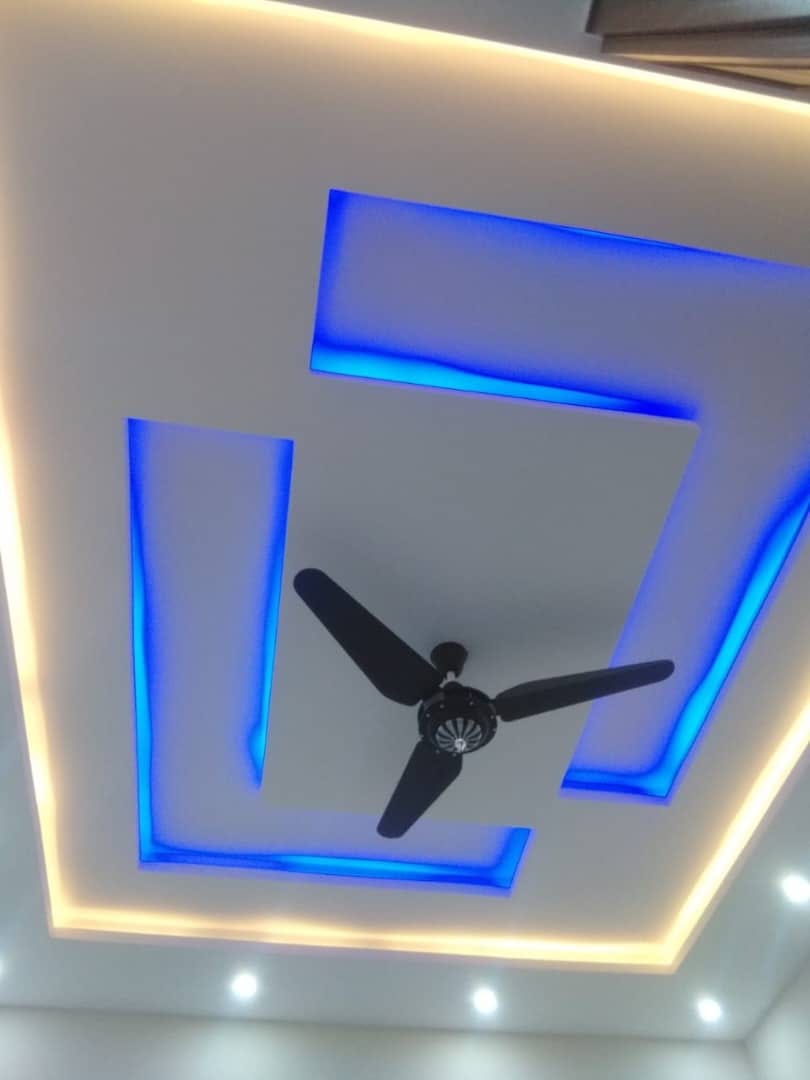 Suspended ceiling with ceiling fan and LED trim