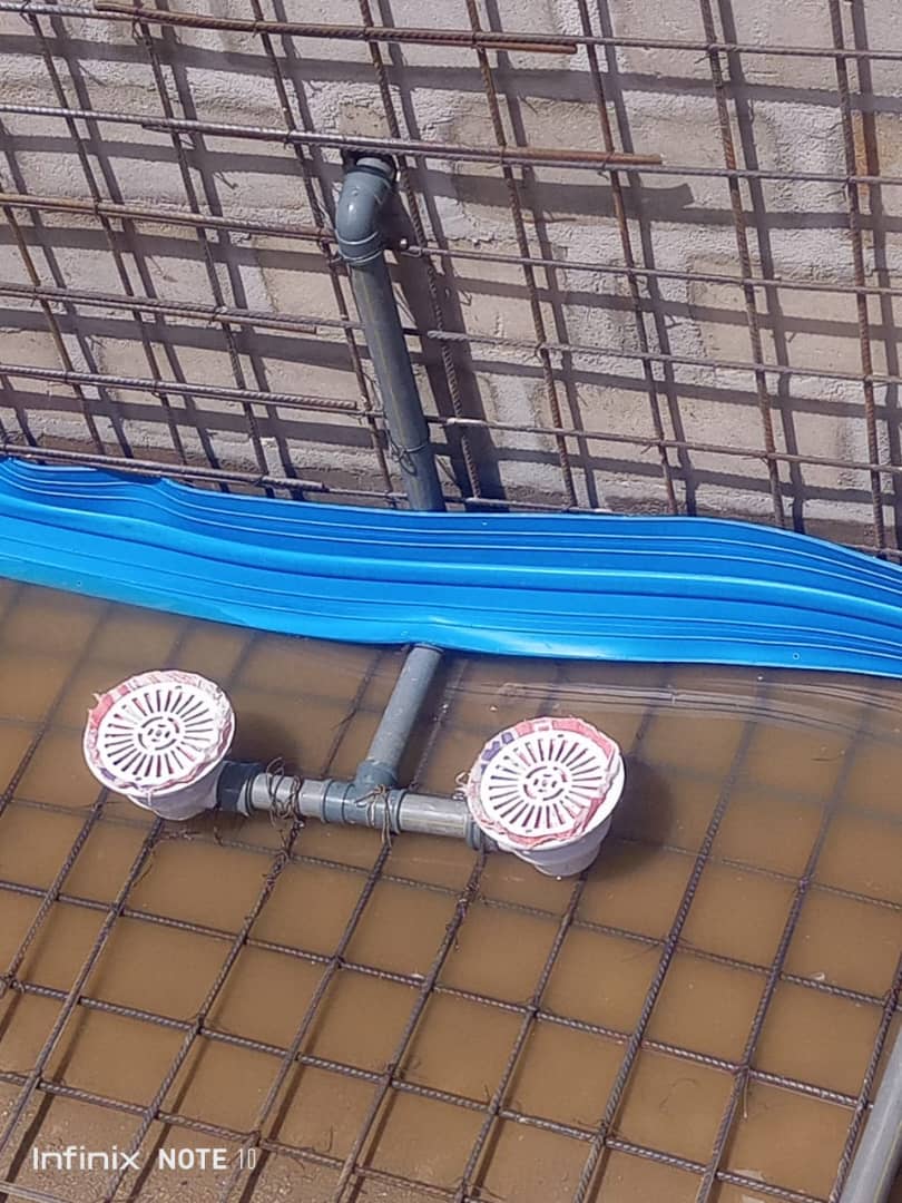 Water bar placement and drain installation