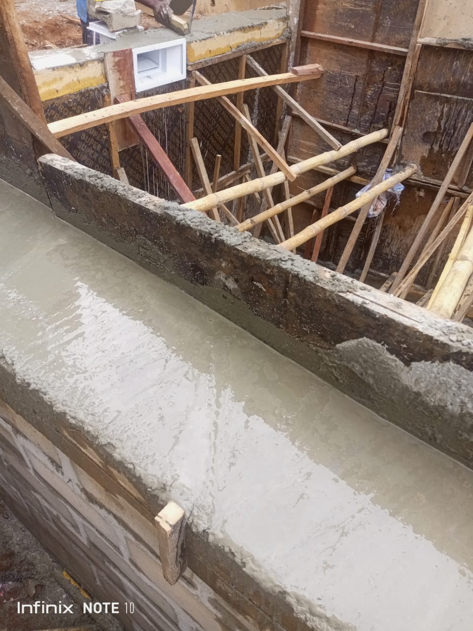 Pool wall casting stage